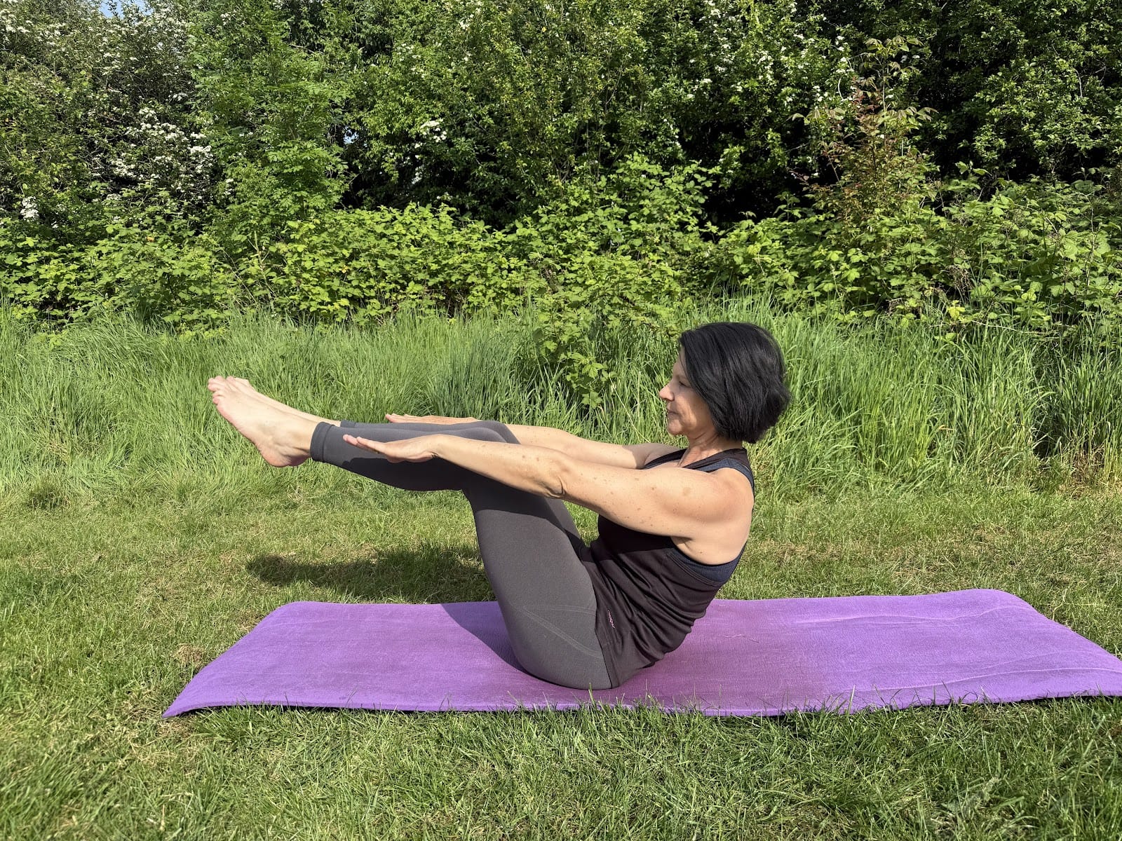 Cindy teaching mat Pilates in Leamington Spa